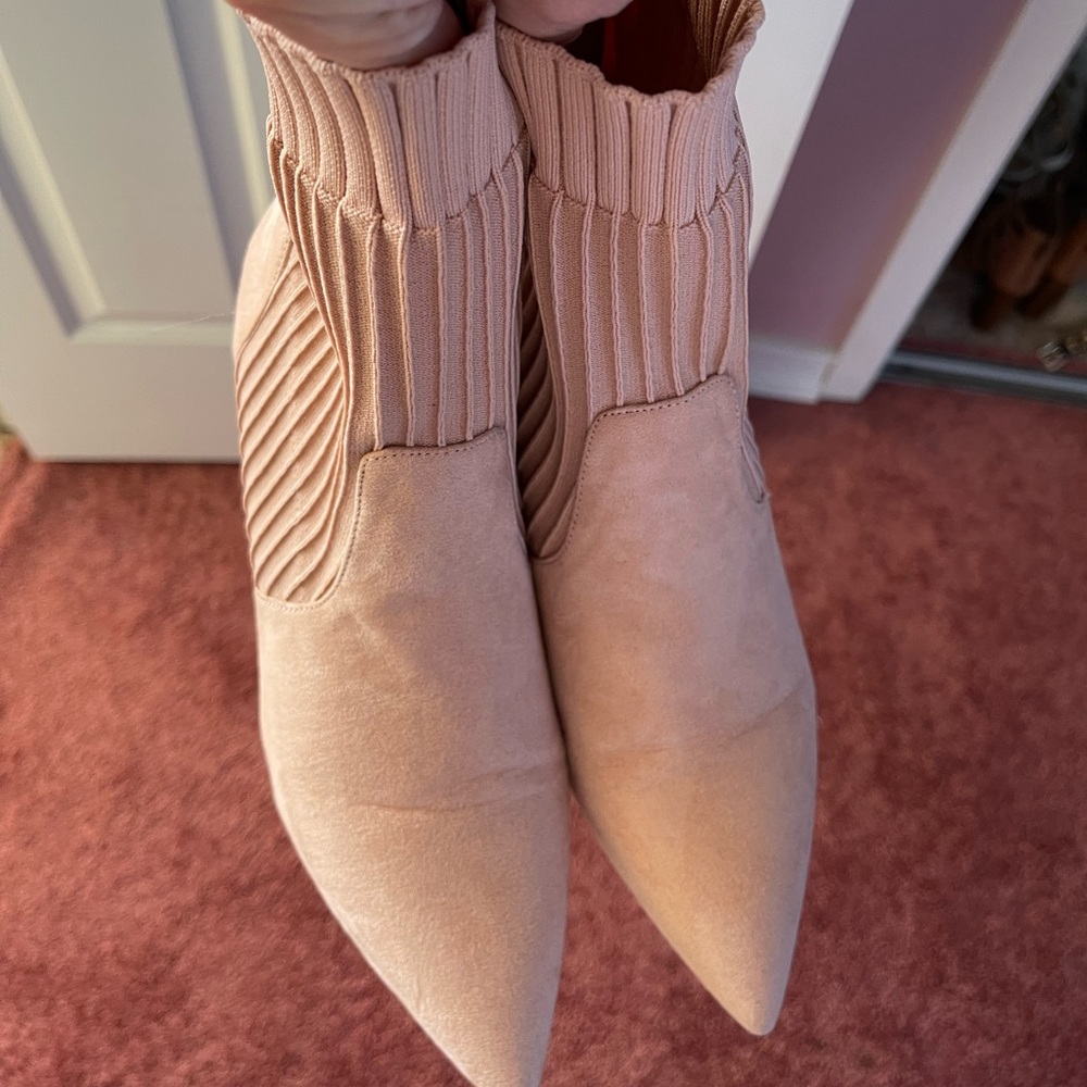 Woman’s light pink boots
